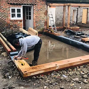 man building wall